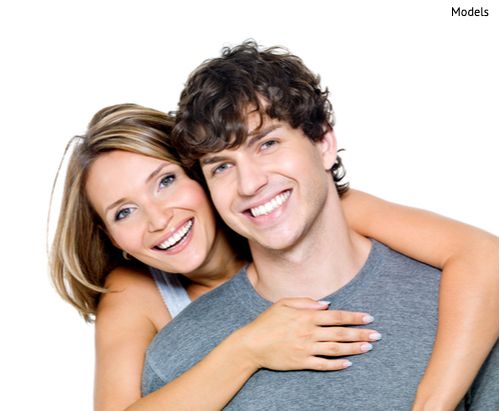 Portrait of a beautiful young happy smiling couple